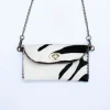 Bolso vaca estilo clutch
