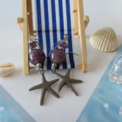 Online Che Carino Art Pendientes estrella de mar con amatista